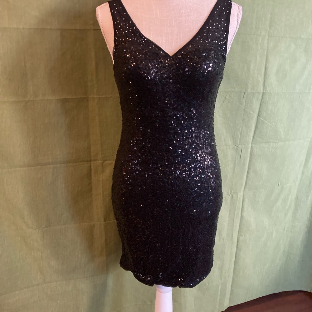 Love Reign black sequin size 7